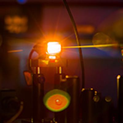 Flash of Light in Research Expo Artwork Comes from a Supercontinuum Laser Source